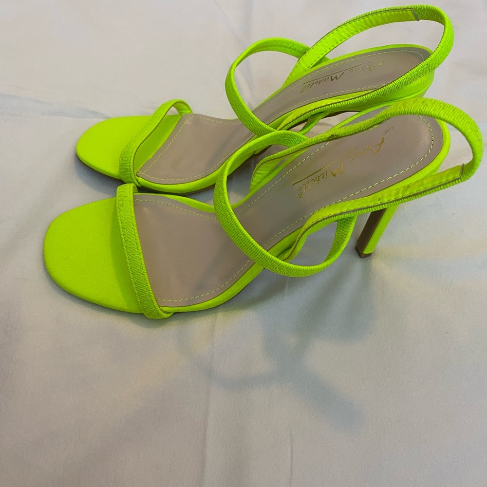 Neon green sandal heels.